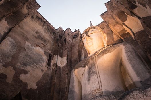 Closeup of Pra AdJaNa buddha sculpture from Wat Si Chum, Sukhothai historical park, Thailand