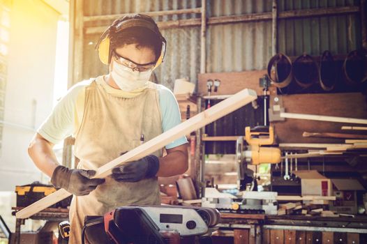 Portrait of carpenter man with him job