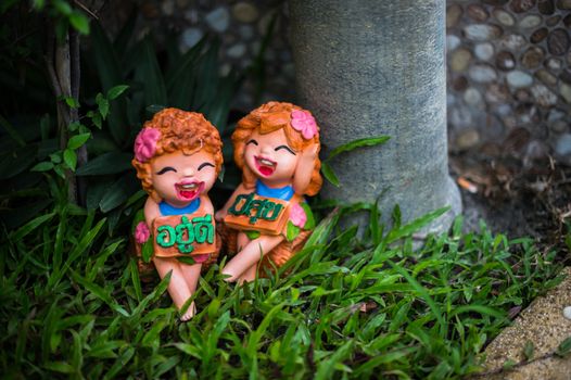 Funny doll sculpture, style of Thai garden decorated