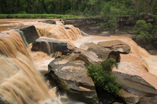Brown of Kaeng So Pha waterfall in nature park, Phitsanulok province, Thailand.