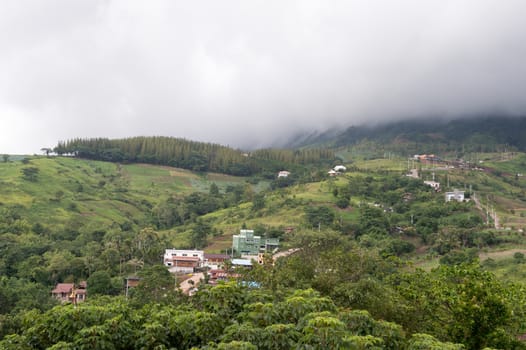 Landscape of cityscape on mountain with clouds sky