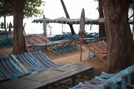 daybed and table on the beach