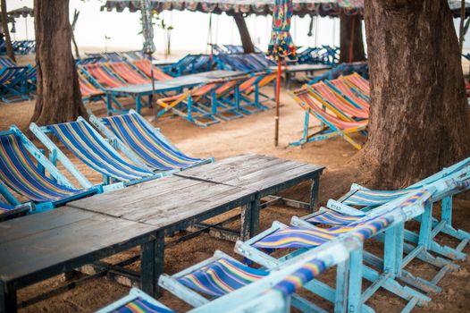 daybed and table on the beach