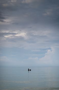 Closeup of fisherman in the sea