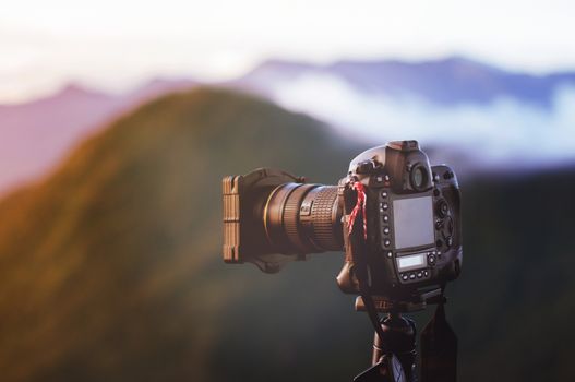 Camera take a photo of sunrise view landscape, Traveler conception.