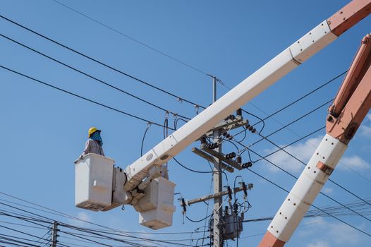 closeup of electrician with him job