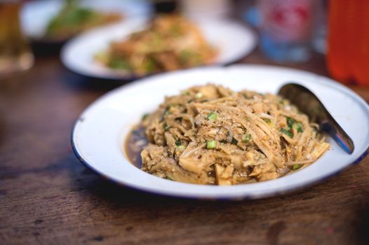 Closeup of asian food style on wooden floor