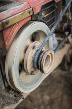 Closeup of fly wheel on engine power