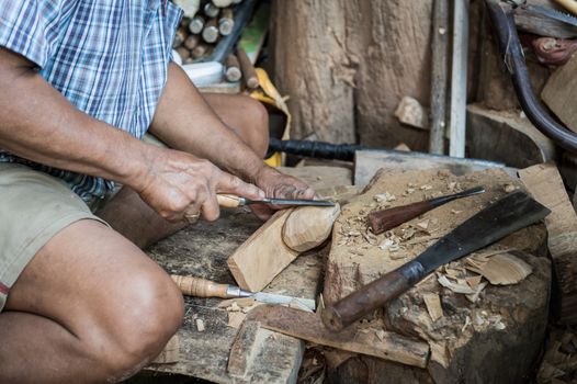 closeup of sculptor man with him job