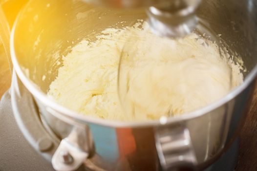 Cream making for home-made butter cakes on a mixer machine