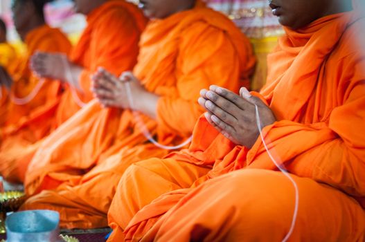 Closeup of monk's hand with pray