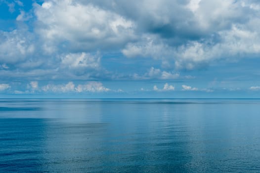Landscape of ocean with clouds sky