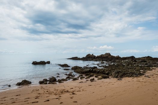 Landscape of sea beach with clouds sky