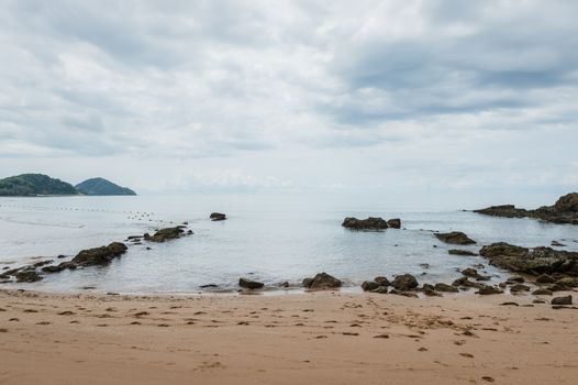 Landscape of sea beach with clouds sky