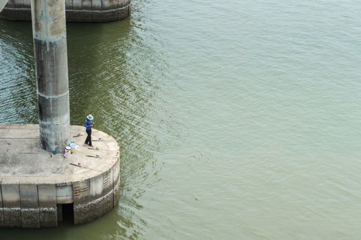 Closeup of fishing man with him job