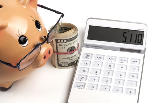 Piggy Bank With Dollars Roll and Calculator Isolated on White Background