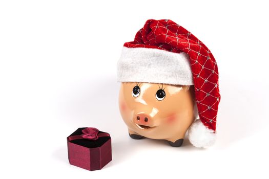 Piggy Bank with Dollars and Chtistmas Gift Box