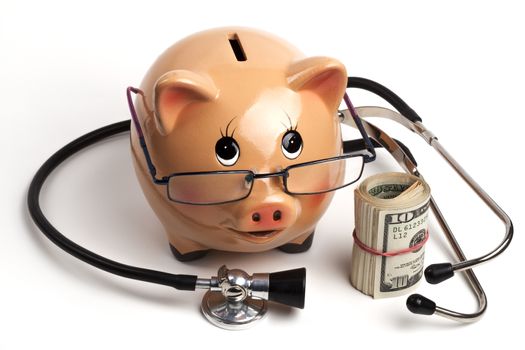 Cute Piggy Bank With Black Stethoscope and Dollars Roll Banknotes Isolated on White Background