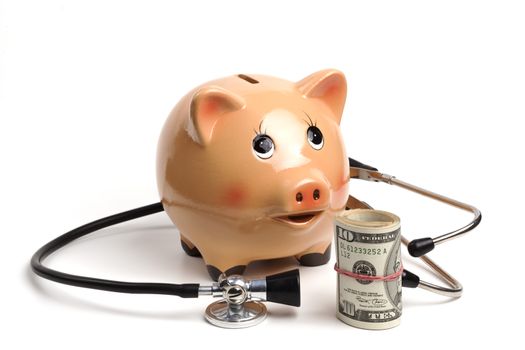 Cute Piggy Bank With Black Stethoscope and Dollars Roll Banknotes Isolated on White Background