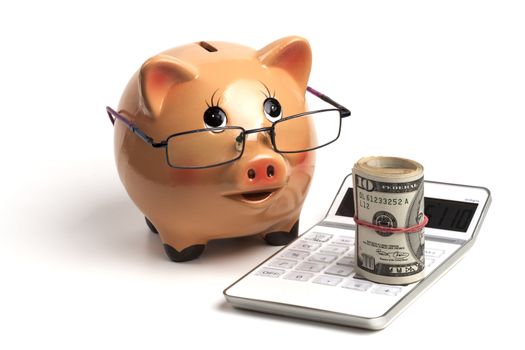 Piggy Bank With Dollars Roll and Calculator Isolated on White Background