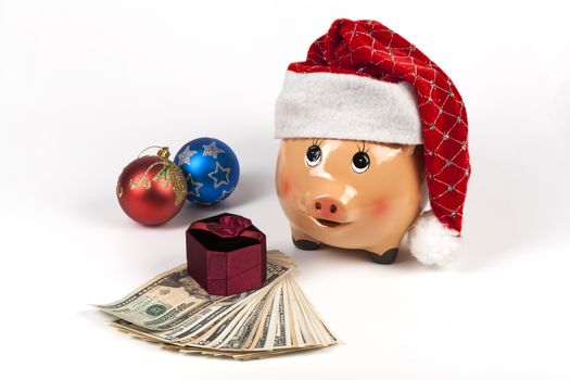 Piggy Bank with Dollars and Chtistmas Gift Box and Decorations