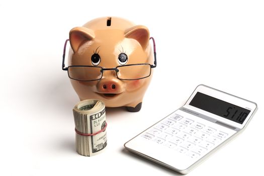 Piggy Bank With Dollars Roll and Calculator Isolated on White Background