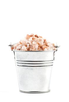 Himalayan Salt Raw Crystals Pile in Silver Metal Bucket Isolated on White Background
