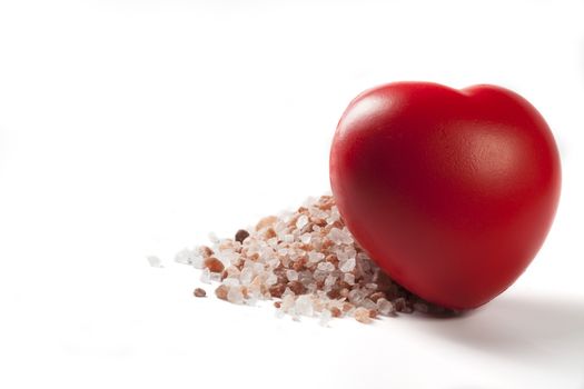 Himalayan Salt Raw Crystals With Red Heart Isolated on White Background