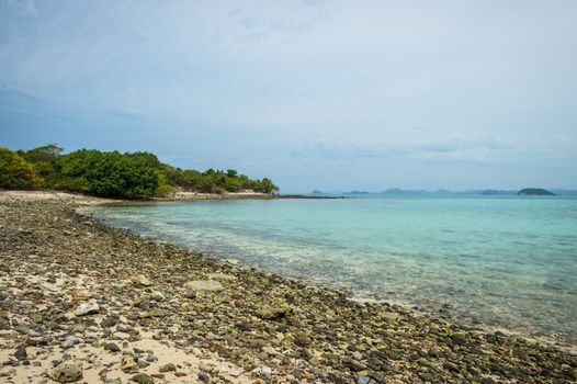 Landscape of beach and sea with mountain