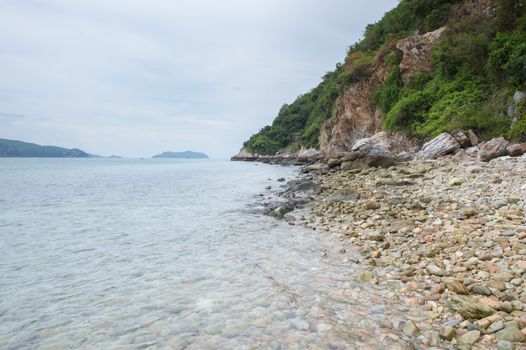 Landscape of beach and sea with mountain