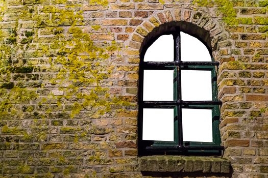 mossy brick wall with a old wooden window frame, empty framework isolated on white