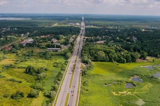 Aerial view of road in Latvia. Latvia from above.