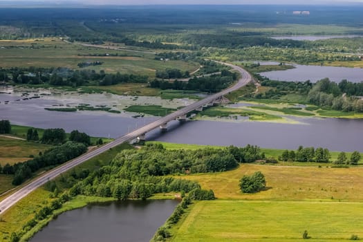 Latvia from above. Aerial view of river Lielupe bridge in Latvia.