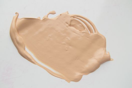 Concealer, light beige makeup, smear cream base, Foundation on white background