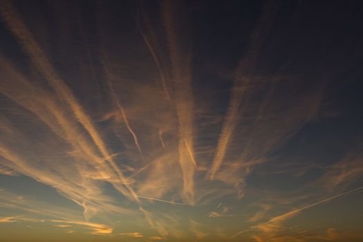 Airplane Trails on Morning Sunrise Cloudy Sky