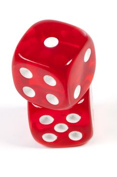 Isolated red casino dice on white ackground