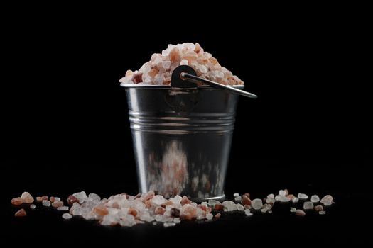 Silver Metal Bucket With Himalayan Salt on Black Background