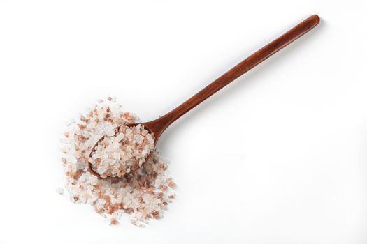 Himalayan Salt Raw Crystals Pile with Brown Wood Spoon Isolated on White Background