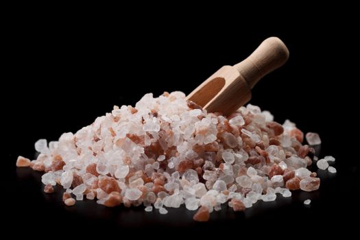 Wook Spoon in Himalayan Salt Crystals on Black Background