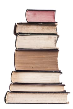 Old books pile isolated on white background