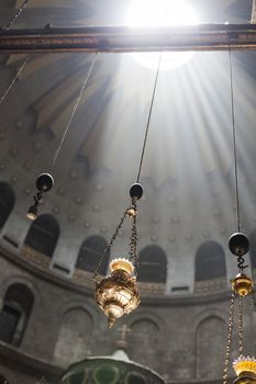 The cieling of the churf of holy sepulcher ith sun rays
