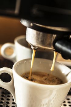 A coffee machine doing delicious coffee in the morning