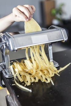 Making homemade pasta with flour and eggs