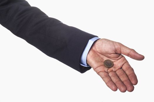 Man Hand in Suit Holding one single euro coin isolated on white background