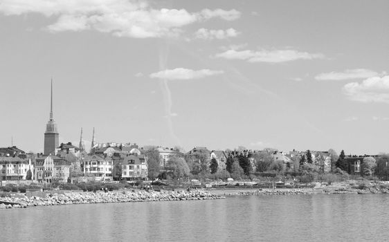 View from the shoreline of Munkkisaari district in Helsinki, across the Finnish Gulf to Eira district - monochrome processing

