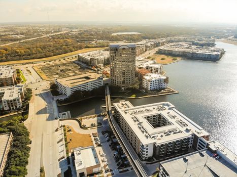 Aerial view downtown Las Colinas, Irving, Texas and light rail system (Area Personal Transit, APT). Las Colinas is an upscale, developed area in the Dallas suburb