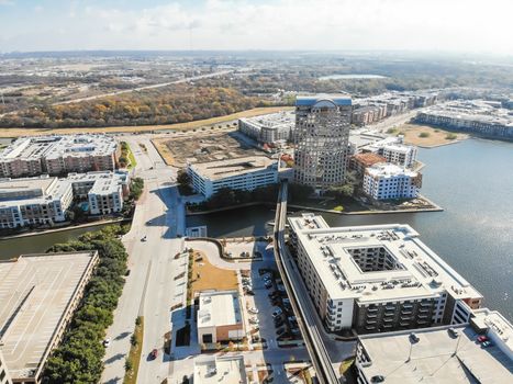 Aerial view downtown Las Colinas, Irving, Texas and light rail system (Area Personal Transit, APT). Las Colinas is an upscale, developed area in the Dallas suburb