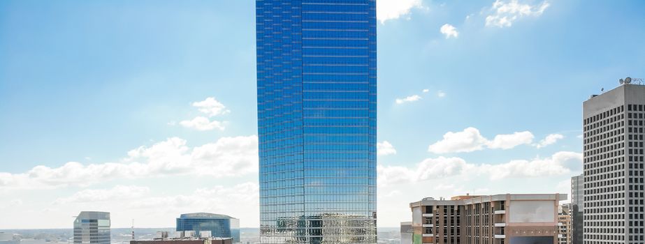 Panorama aerial view of downtown Dallas, Texas during sunny autumn day with colorful fall foliages