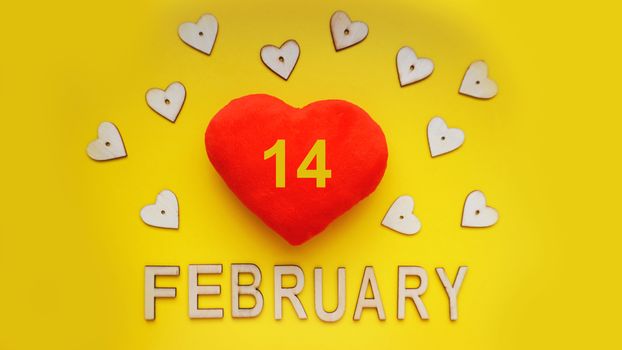 Valentines day background with hearts on yellow background - 14 february. Top view. For banner, cards design