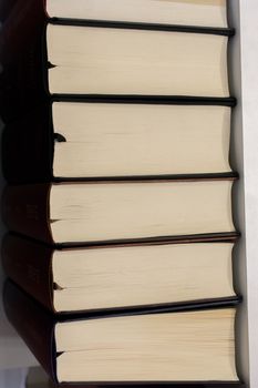 Stack of books stored as  Education and  business concept